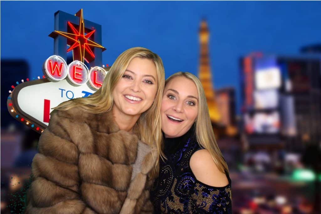 Two Women in Photo Booth with Las Vegas Back Drop